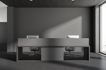 Grey reception interior desk with two computers and mockup