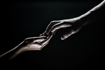 Two hands. Helping hand to a friend. Rescue or helping gesture of hands. Concept of salvation....