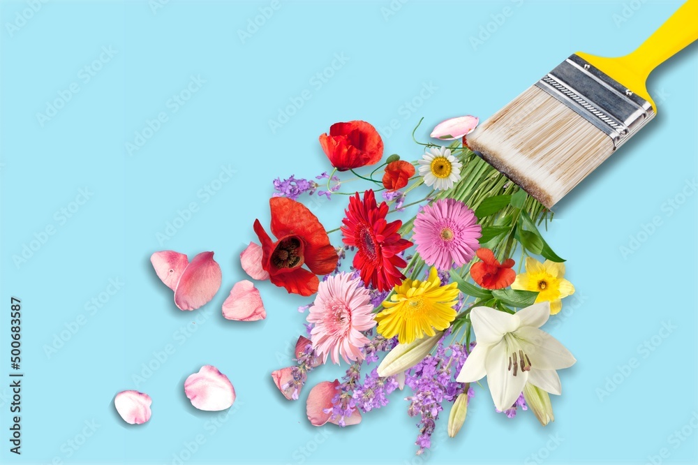 Poster Spring or summer concept. Flowers and paint brush on pastel background. Flowers composition.