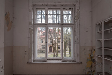 Fototapeta premium Urban exploration in an old abandoned hospital in a historic mansion in Poland - Urbex in Turczynek