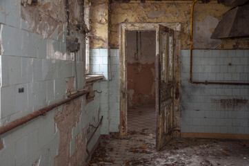 Fototapeta na wymiar Urban exploration in an old abandoned hospital in a historic mansion in Poland - Urbex in Turczynek