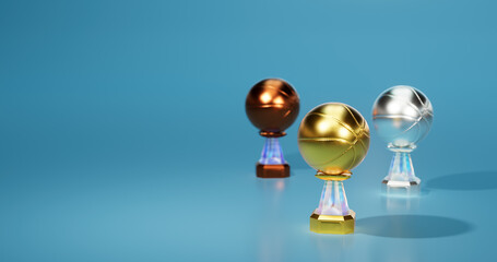 Bright Basketball Gold Silver and Bronze Trophies Focused on Gold with a soft light background