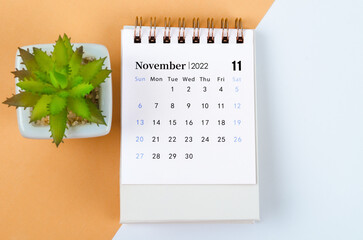 November 2022 desk calendar with tree pot.