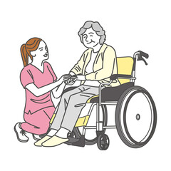 車椅子に乗るシニア女性と介護スタッフ