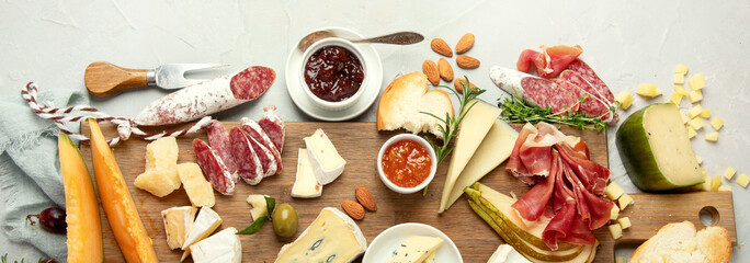 Cheese assortment on light background.