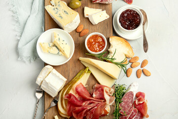 Cheese assortment on light background.