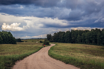 Field road in Masurian Lakeland area of Warmia and Mazury region, Poland