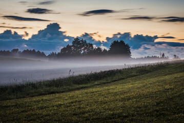 Foggy landscape in Masurian Lakeland area of Warmia and Mazury region, Poland