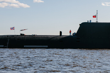 View from a boat on a nuclear submarine with ballistic missiles in the waters of the Gulf of...