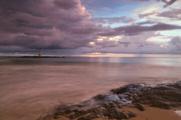Seascape with lighthouse beacon tower and cloudy sky of Khao Lak