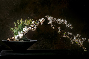 Spring ikebana with white flowers - 500701986