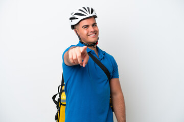 Young caucasian man with thermal backpack isolated on white background points finger at you with a confident expression