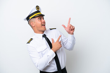Airplane pilot caucasian man isolated on white background pointing with the index finger a great idea