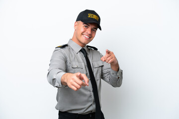 Young caucasian security man isolated on white background pointing to the front and smiling