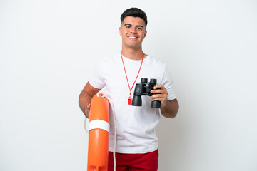 Young handsome man isolated on white background with lifeguard equipment and with binoculars