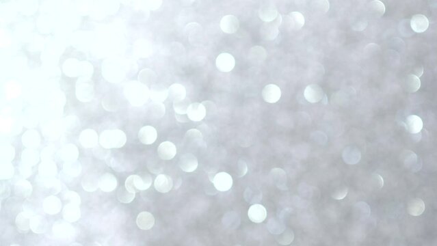 abstract bokeh background with silver glitter background