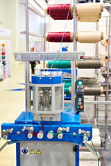 Bobbins of thread for cord knitting machine