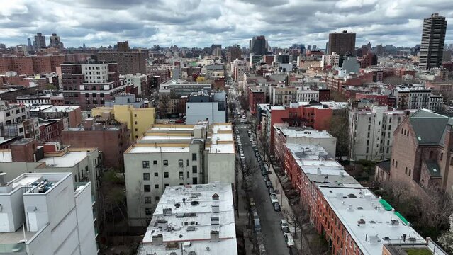 aerial moving side over East Harlem in NYC