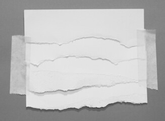 Fototapeta premium torn paper with adhesive tape, space for your message