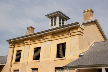 Fototapeta na wymiar Historic buildings called The Barracks originally built as a hospital for invalid convicts