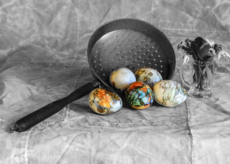 old time copper dish, painted eggs in the foreground, celebration of Easter, still life