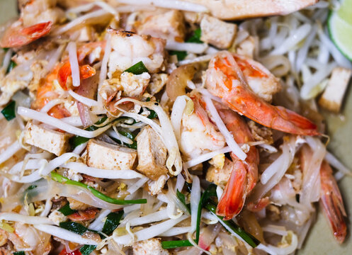 Pad thai, phat thai, or phad thai, is a stir-fried rice noodle dish commonly served as a street food in Thailand as part of the country's cuisine.
