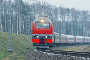 Passenger train moves.