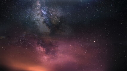 Obraz premium starry sky blue lilac nebula at sunset weather forecast milky way cosmic nature landscape 