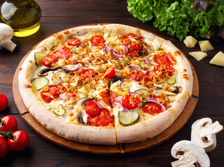 Pizza with mushrooms, champignons, vegetables, mozzarella cheese and fried onions. Freshly baked vegetarian dish. Menu of cafes, pizzeria, restaurant. Close up. Copy space. Fresh champignons, cherry