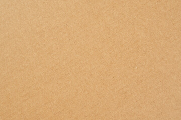 Fototapeta na wymiar Recycled wrapping kraft paper texture. Grunge brown package cardboard background