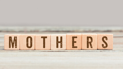 Word Mothers on wood cubes