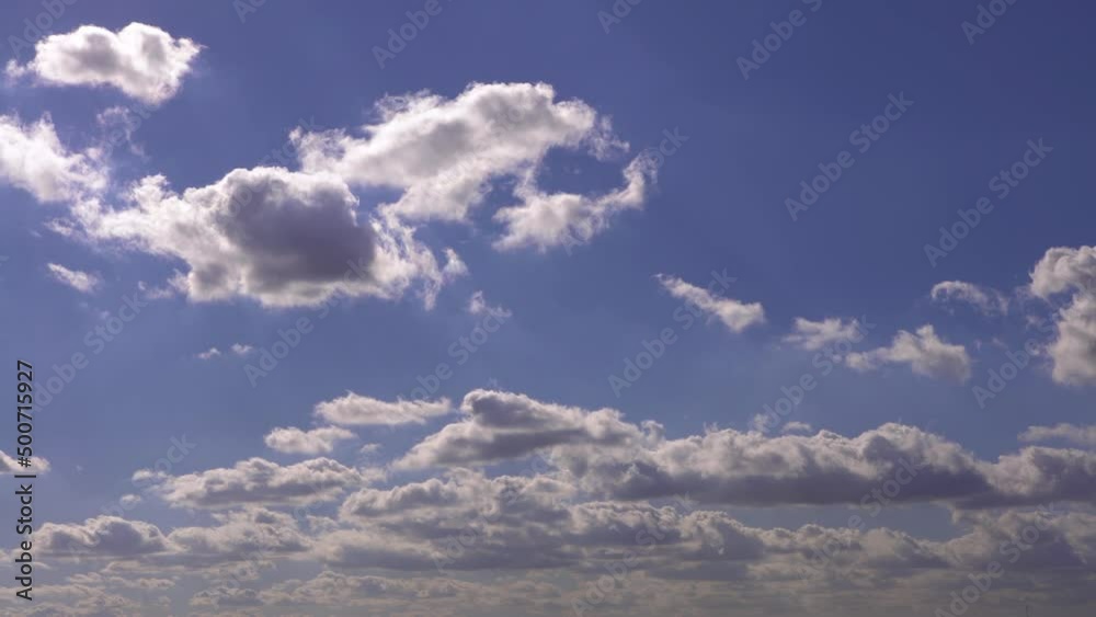Wall mural cumulus clouds with blue sky on a sunny day of summer. beautiful cloudscape as nature background pan