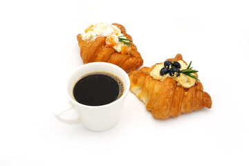 Cup Coffee and fruit croissant on white background.