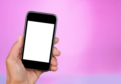 Hand holds phone Sample social media app interface on mobile phone showing shared video content