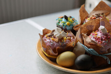 Easter cakes with colorful eggs on the table.  Happy Easter. Homemade cakes for holidays, healthy food, healthy sweets for children