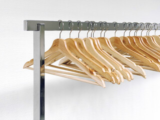 Clothes hangers metal rail. Retail shoping sale concept