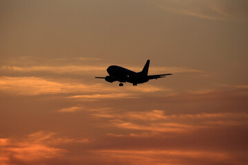 airplane in the sunset
