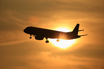 airplane at sunset