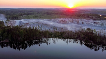 Fototapeta premium Flight over lakes and forests in Karelia near the village of Kuznechnoye in Russia.