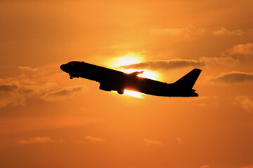 airplane at sunset