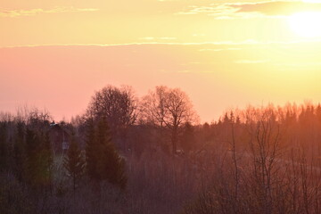 Naklejka na ściany i meble Sunset in the countryside spring 