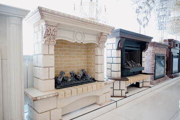 Fireplace.New fireplace in the store close-up. - obrazy, fototapety, plakaty