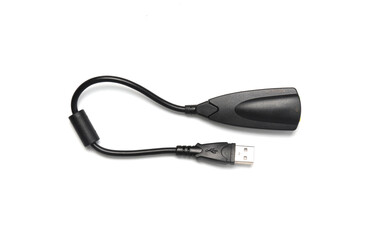 Black USB 2.0 external sound card audio adapter for headphones and microphone isolated on white background.