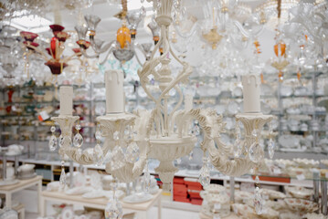 White color chandelier in vintage style close-up