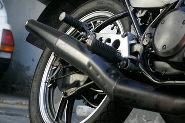 rear wheel and exhaust pipe of a motorcycle
