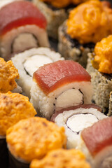 Japanese cuisine fresh rolls with fish close-up
