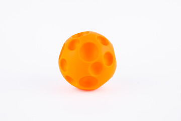 an orange rubber ball for dog child toy on white background