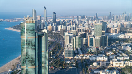 Abu Dhabi, United Arab Emirates - February 2022: Panoramic Abu Dhabi city skyline in United Arab Emirates. Abu Dhabi attracts 10 million people annually.