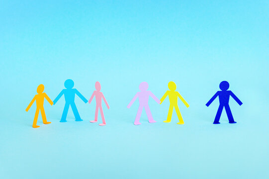 group of paper people silhouettes standing in rows, concept of different types and diversity in relationships