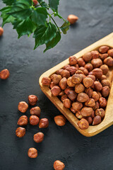 Hazelnuts on a dark background top view  